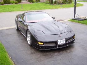 1997-2004 Chevy Corvette C5 APR Carbon Fiber Front Splitter With Rods