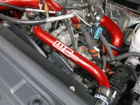 WCFab 2011-2016 LML Duramax Upper Coolant Pipe Fluorescent Pink Two Stage Powder Coating - WCF100696-FP - Wehrli Custom Fabrication